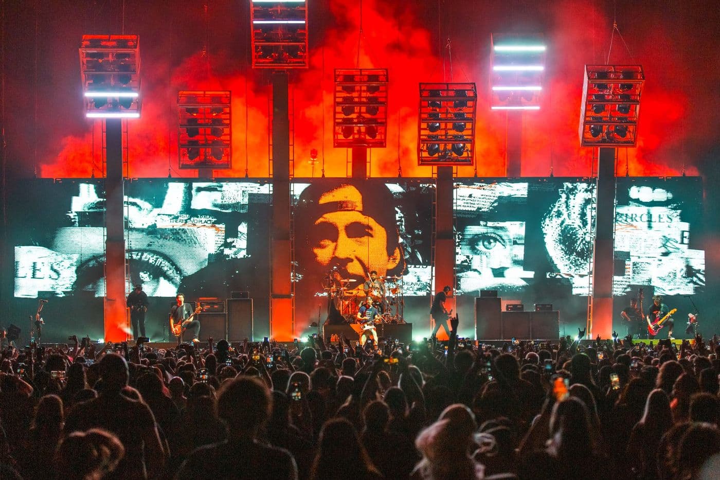 Pierce The Veil with FRAY Studio visuals showing singer’s face on fragmented LED backdrop under red smoke and hanging lights