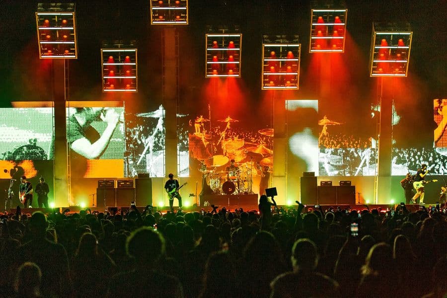 the 5 screens showing messed up and fragmented multiple live camera feeds in yellows and reds