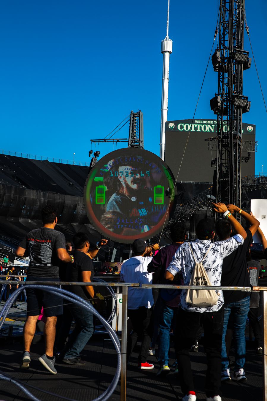 Close up of the venue screens as the people walk in